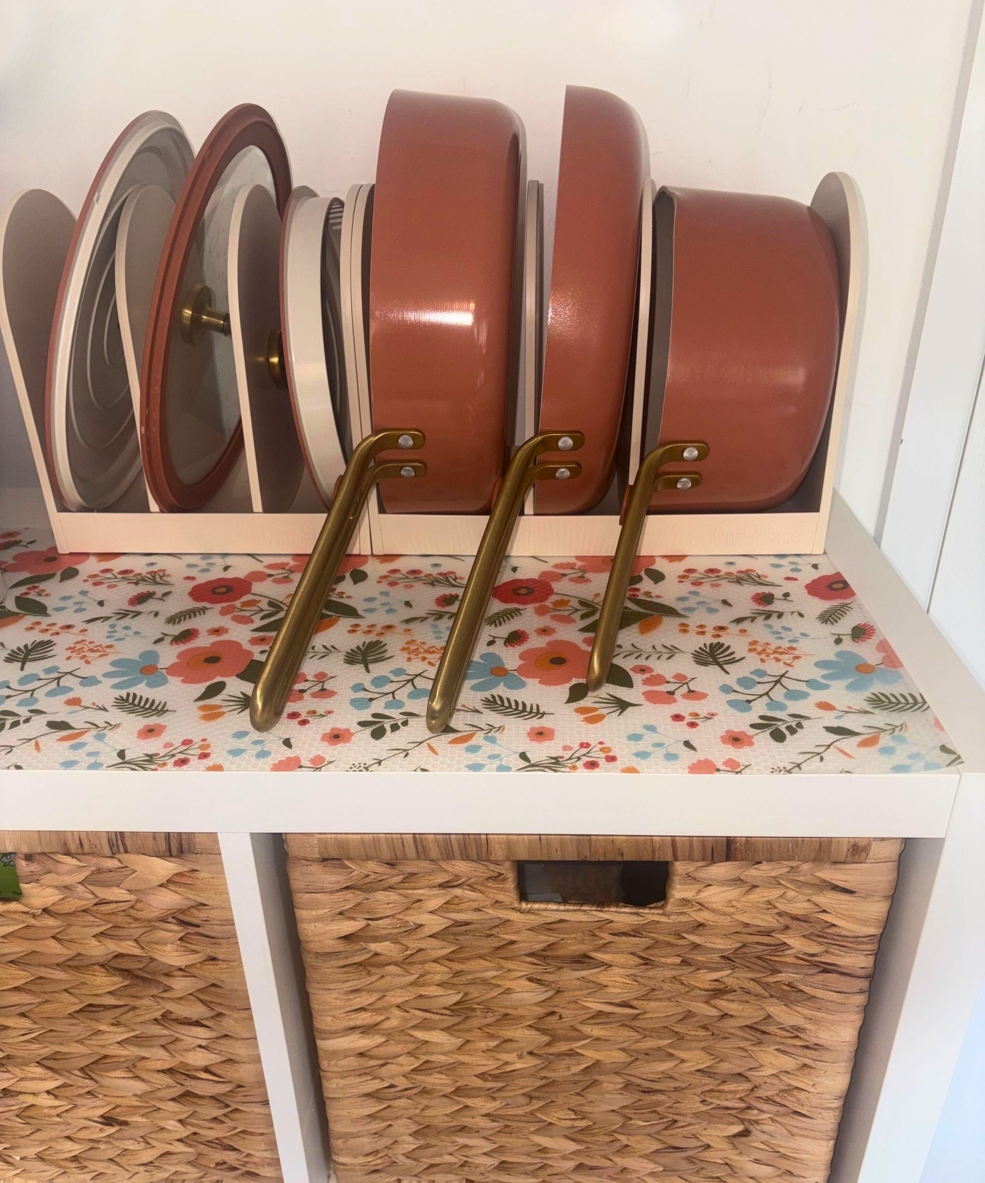My Our Place pots and pans sit on top of my KALLAX in their organizer