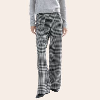 flat lay image of plaid trousers