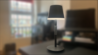 Philips Hue Go portable table lamp on a desk