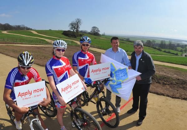 British national team members help welcome the media and interested fans to the newly completed 2012 London Olympic Games mountain bike course in Hadleigh Park, Essex