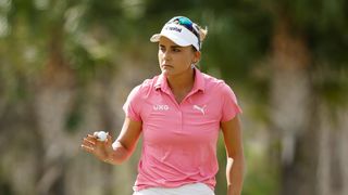 Lexi Thompson holds up a ball at the Grant Thornton Invitational 2023