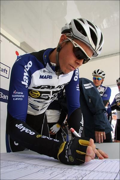 A Team Jayco - Skins rider at the sign-in table.
