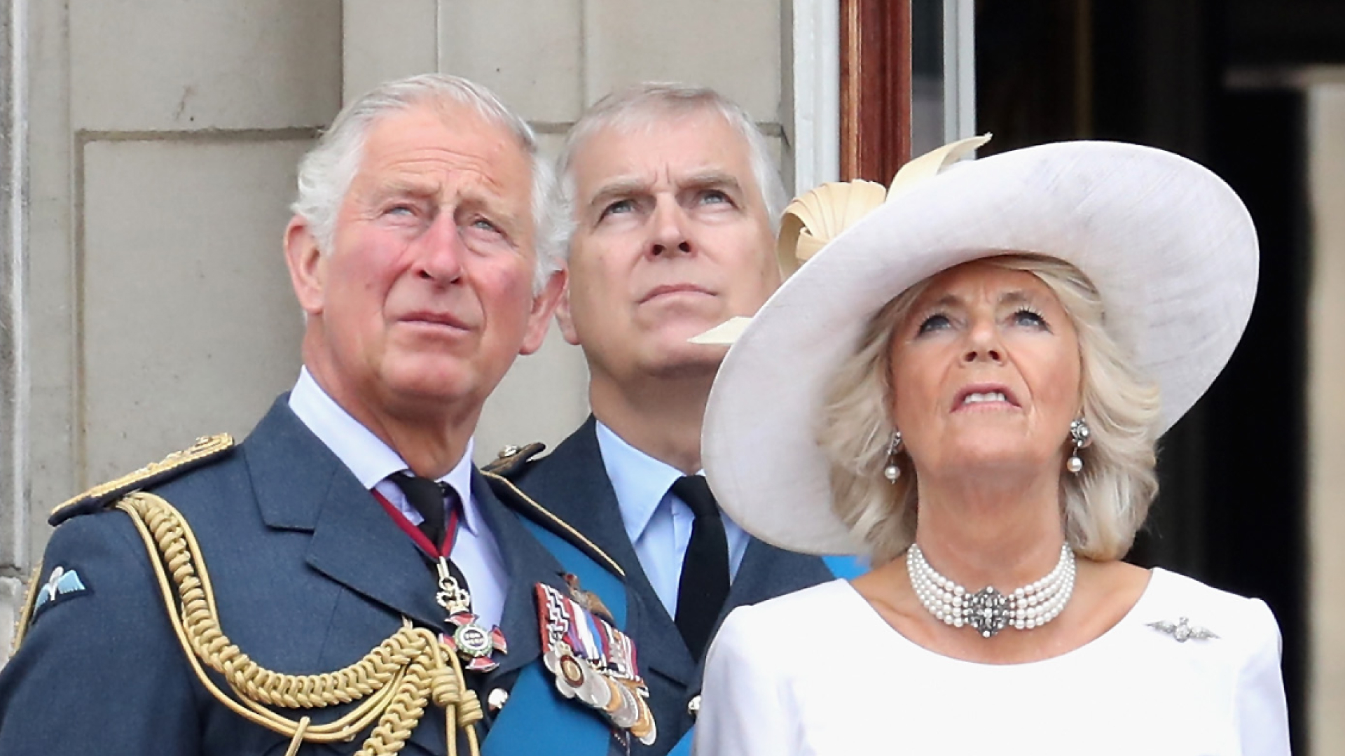 King Charles, Prince Andrew, and Queen Camilla stand on the balcony of Buckingham Palace to mark the centenary of the RAF on July 10, 2018