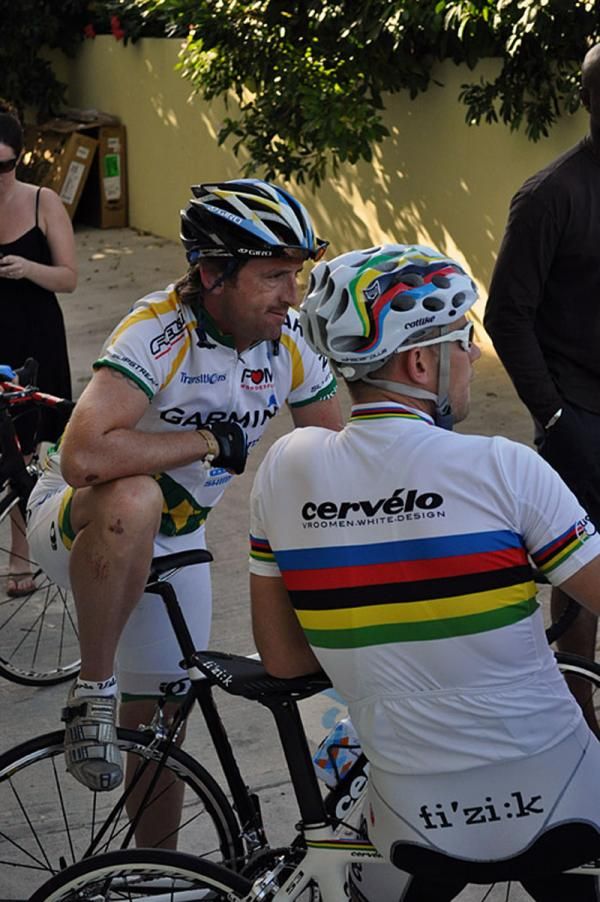 Matt White and world champion Thor Hushovd await the start of the ride