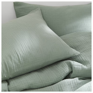 A muslin king duvet cover set in sage green from H&M