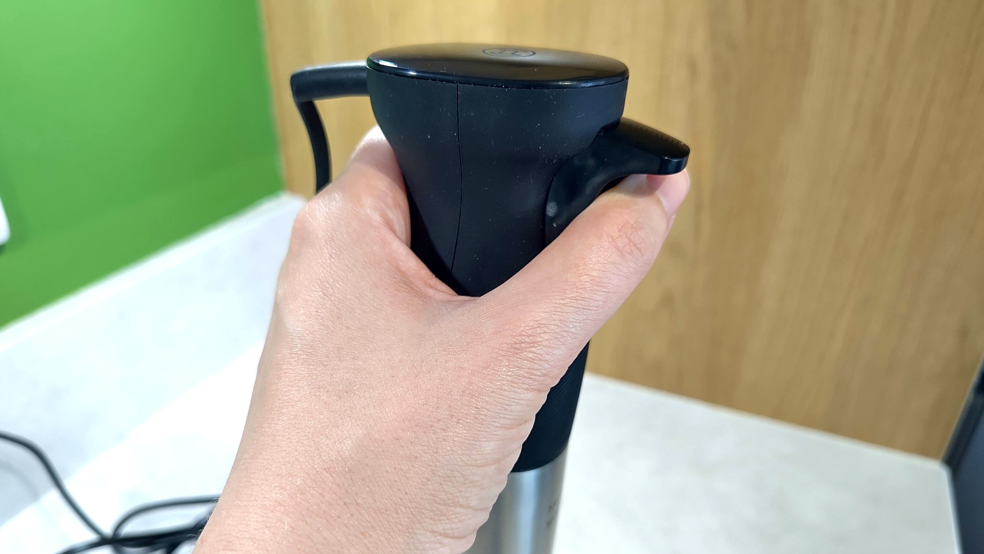 Person's hand operating Bosch ErgoMaster Series 6 blender