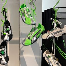 The first three color ways of PUMA's new H Street sneakers hanging at an activation for the shoe's launch in Seoul, Korea.