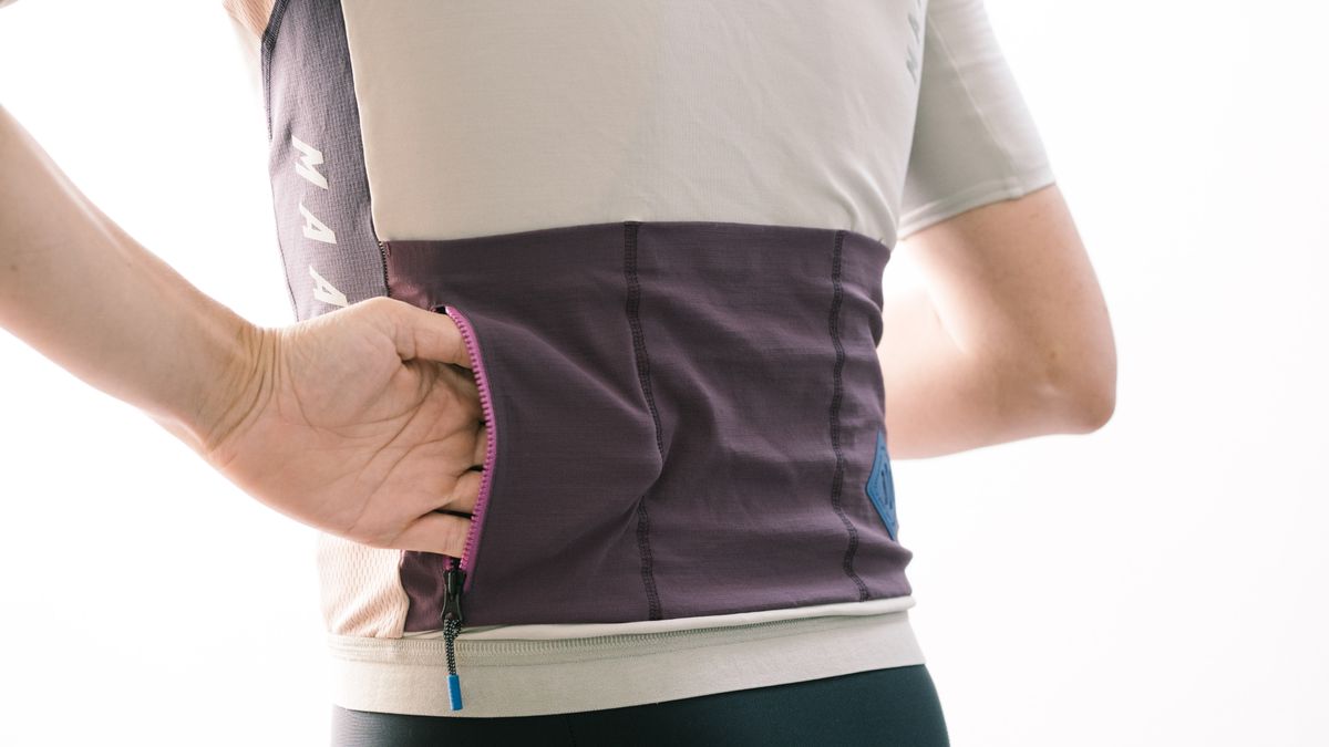 Maap Alt_Road jersey worn by a man against a white wall