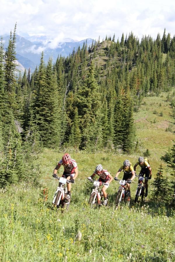 Team Rocky Mountain and KONA duel up Fernie Ridge.