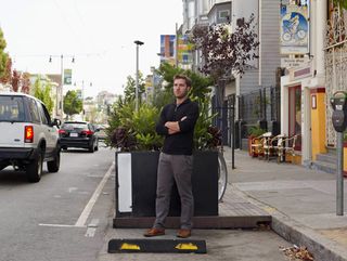 Andres Power, in front of one his reclaimed parking