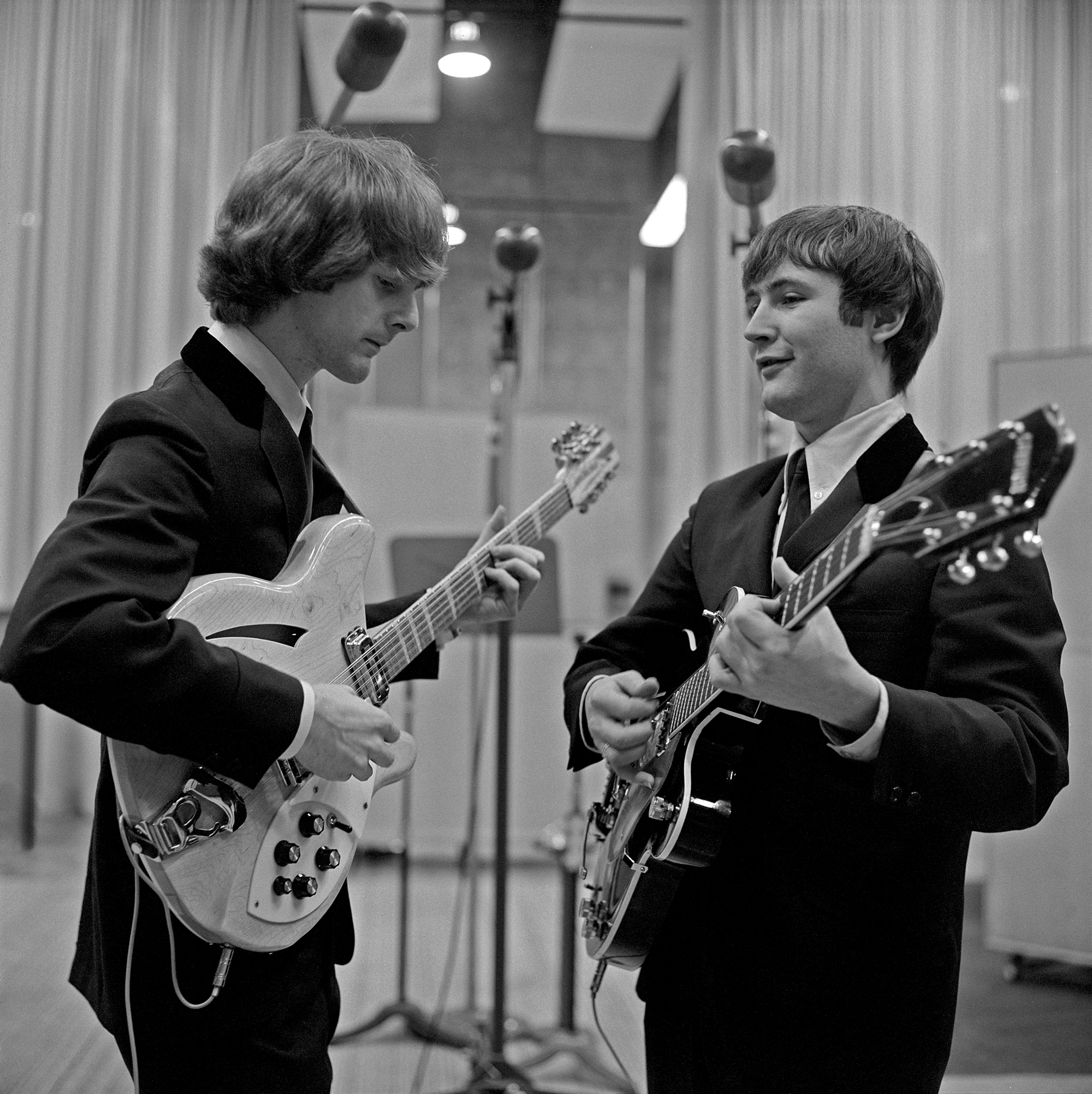 Jim McGuinn (later referred to as Roger McGuinn) and David Crosby of The Byrds at a recording session in Los Angeles, California, January 28, 1965.