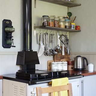 kitchen with shelving and jars