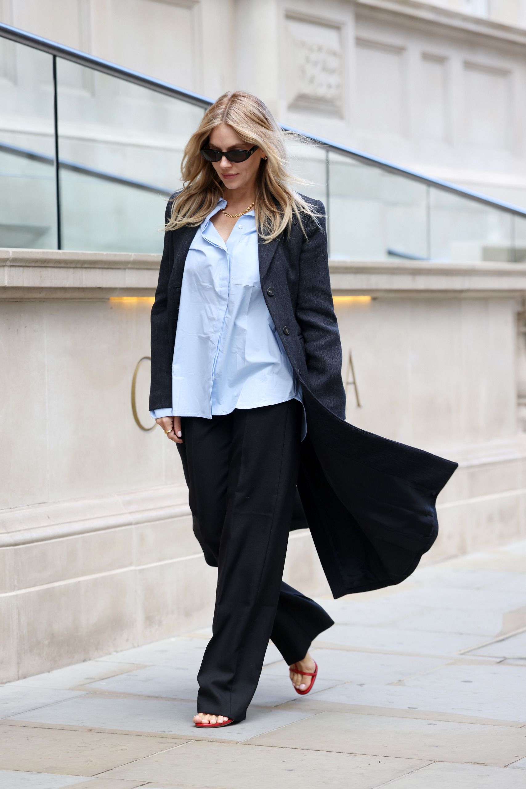 Sienna Miller wearing Jude Mixer Sandals in 2026.