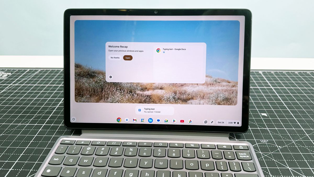 Close up of the Welcome Recap screen on the Lenovo Chromebook Duet 11 Gen 9, against a black table mat and blue background.