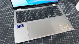 The keyboard deck of the Asus Vivobook 16 Flip convertible laptop.