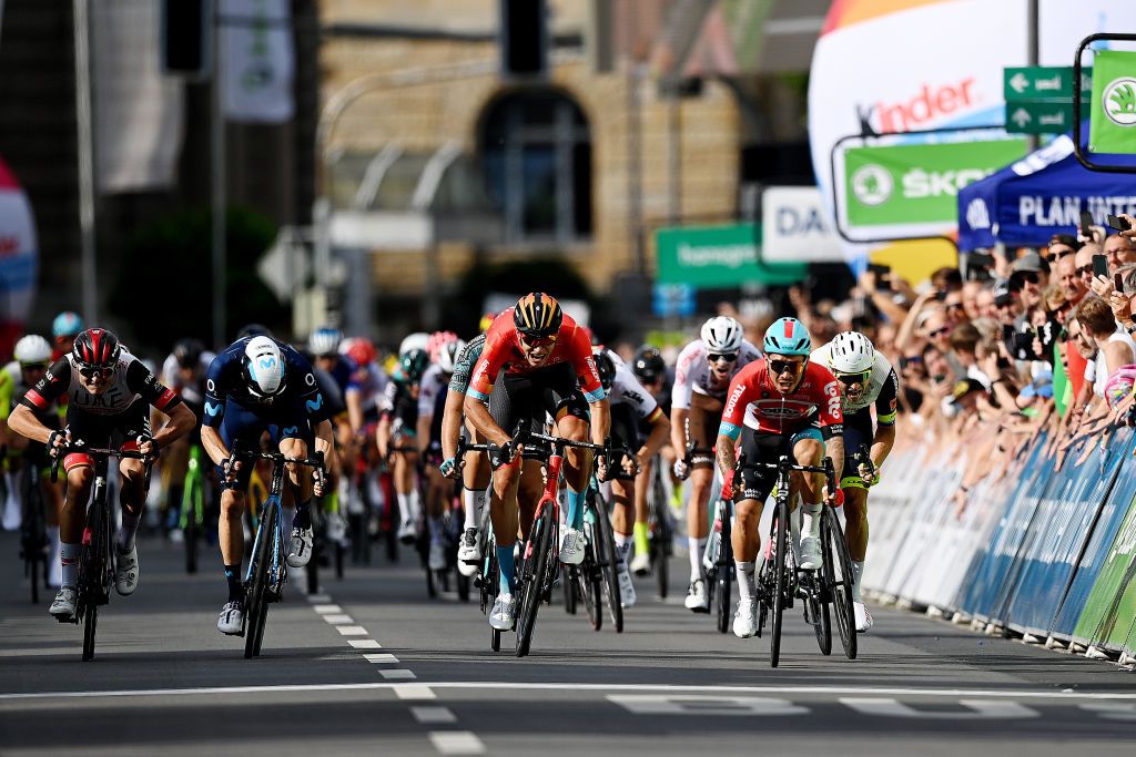 MEININGEN GERMANY AUGUST 25 Caleb Ewan of Australia and Team Lotto Soudal Jonathan Milan of Italy and Team Bahrain Victorious Max Kanter of Germany and Movistar Team and Felix Gro of Germany and UAE Team Emirates sprint to win during the 37th Deutschland Tour 2022 Stage 1 a 1717km stage from Weimar to Meiningen DeineTour on August 25 2022 in Meiningen Germany Photo by Stuart FranklinGetty Images