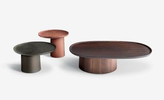 Three wooden tables with offset tabletop