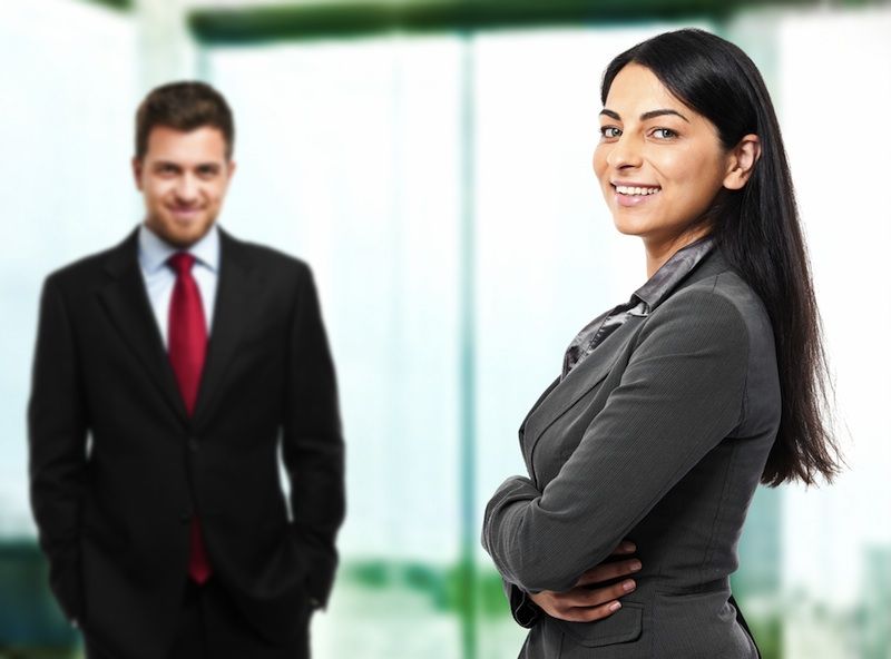 Man and woman in professional clothing.