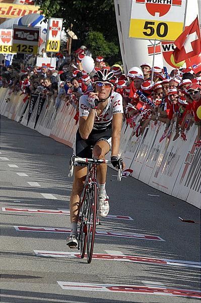 Fr&auml;nk Schleck (CSC) thanks his lucky stars as he crosses the finish line unscathed after a nasty fall.