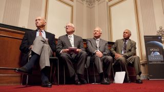 Apollo 11 Astronauts, from left, Michael Collins, Neil Armstrong, Buzz Aldrin and NASA Administrator Charles Bolden attend the U.S House of Representatives Committee on Science and Technology tribute to the Apollo 11 Astronauts.