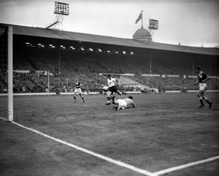 Harry Gregg in action for Northern Ireland against England