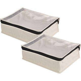 set of two cream canvas underbed storage bags with cedar panels