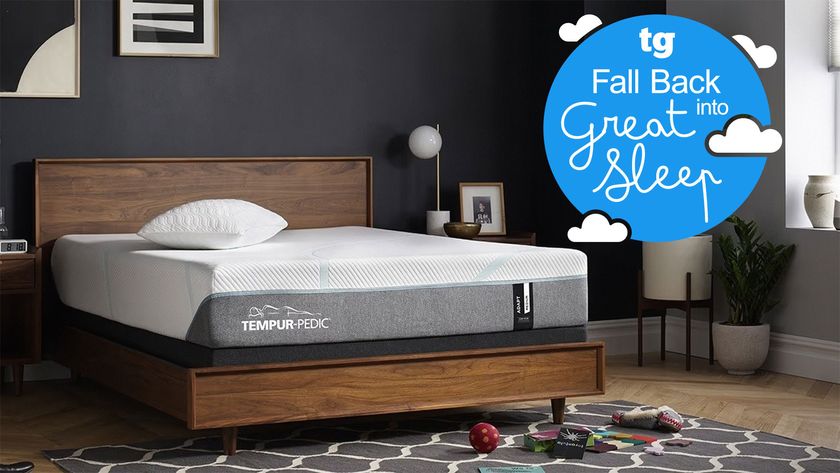 Tempur-Pedic Tempur-Adapt mattress in a bedroom, with a Tom&#039;s Guide &#039;Fall Back into Great Sleep&#039; badge overlaid