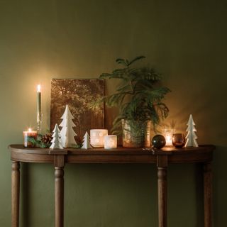 Christmas New Year's Eve decorating ideas candles on console by Neptune