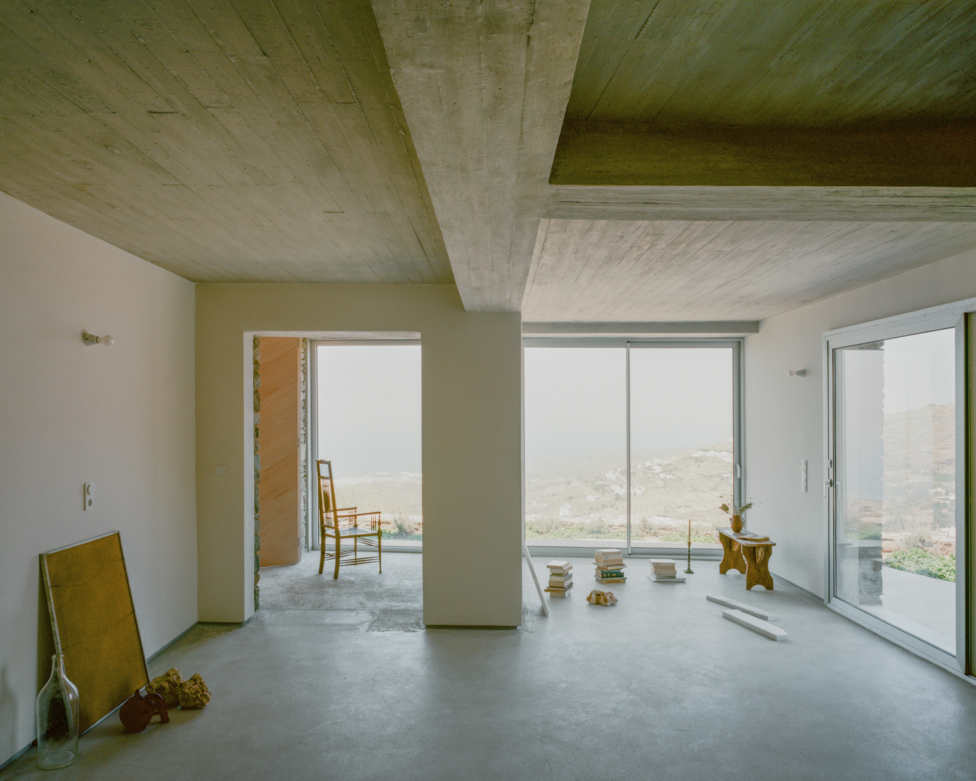 view of a Tinos house, using local vernacular such as stone walls and contemporary design