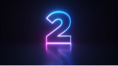 A glowing number 2 in pink and blue against a black background.