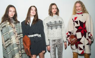 Isabel Marant's A/W 2018 show knitwear with nordic patterns and a navy pinstripe short suit