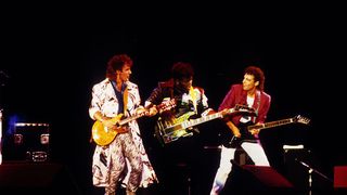 onathan Cain, Randy Jackson and Neal Schon of Journey onstage in Jackson, California, in 1986