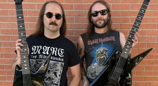 Blood Incantation's Paul Riedl [left] and Morris Kolontyrsky wear dark sunglasses and hold black BC Rich Ironbirds, a guitar Kolontyrsky says is surprisingly suitable for David Gilmour-style solos.