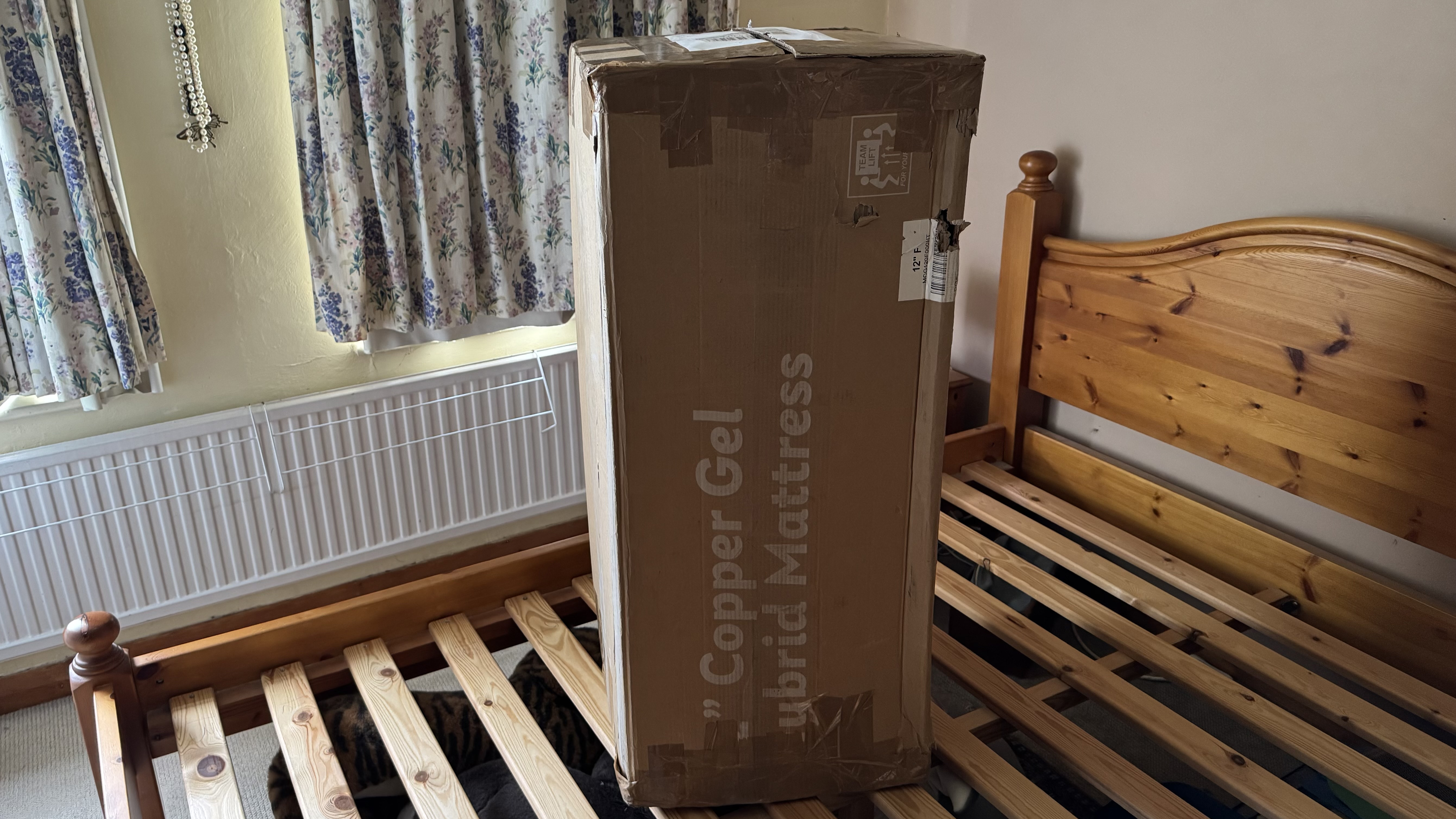 The EGOHOME Hybrid mattress in its delivery box