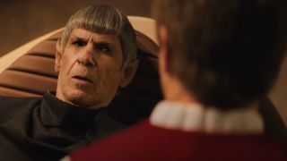 Spock looks at Kirk on his deathbed