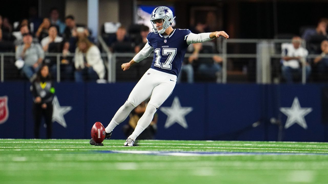 Brandon Aubrey of the Dallas Cowboys kicks off during an NFL football game