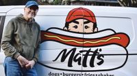 Matt Jones in front of his hot dog truck. 