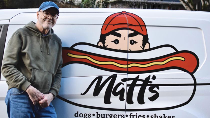 Matt Jones in front of his hot dog truck. 