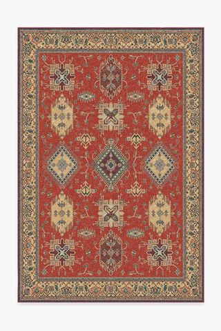 red orange patterned Persian-style rug