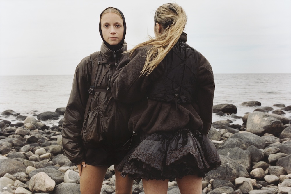 two models wearing the north face x cecilie bahnsen coats