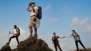 Hikers posing on a mountain