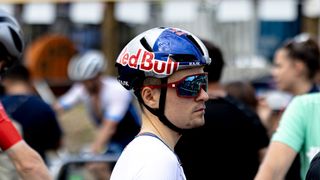 Tom Pidcock wearing Sungod glasses and a Kask Red Bull branded helmet