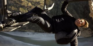 Tom Cruise hanging off a helicopter in Mission: Impossible Fallout