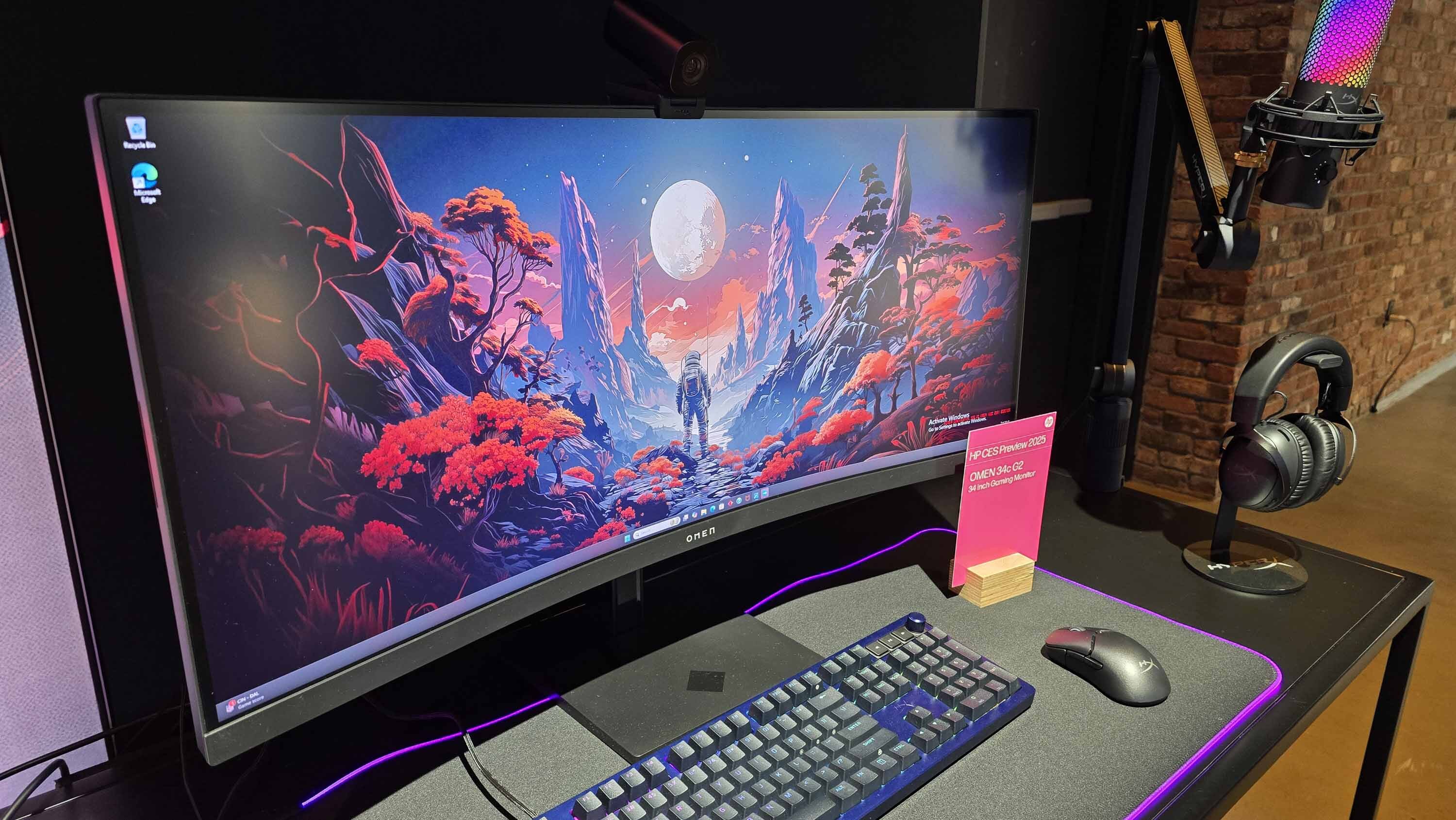 The HP OMEN 34c G2 on a desk.