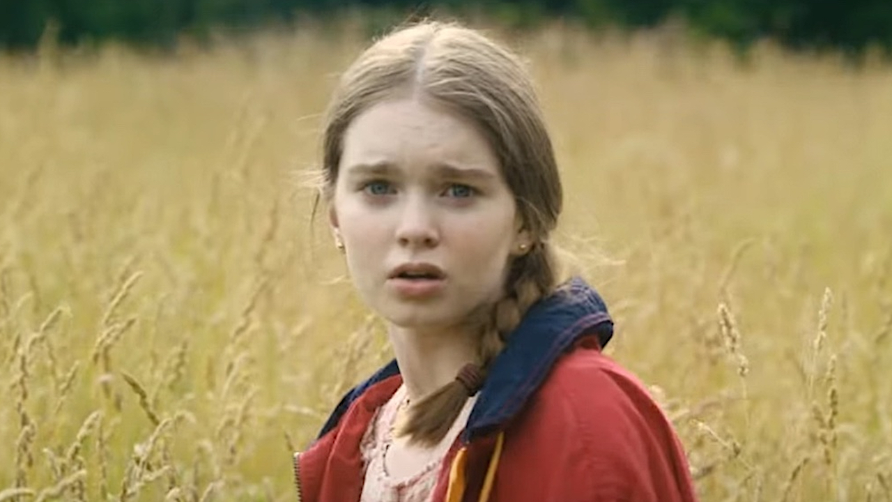 Emerson worried standing in the middle of a field in Spirit in the Blood