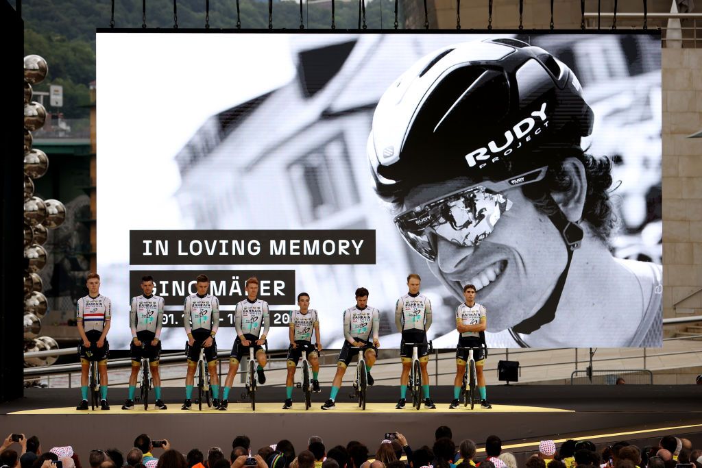 BILBAO SPAIN JUNE 29 A general view of Nikias Arndt of Germany Phil Bauhaus of Germany Pello Bilbao of Spain Jack Haig of Australia Mikel Landa of Spain Matej Mohoric of Slovenia Wout Poels of The Netherlands Fred Wright of United Kingdom and Team Bahrain Victorious pay tribute to their teammate Gino Mder of Switzerland who died on stage 5 of the Tour de Suisse during the team presentation of the 110th Tour de France 2023 at the Guggenheim Museum Bilbao UCIWT on June 29 2023 in Bilbao Spain Photo by Michael SteeleGetty Images