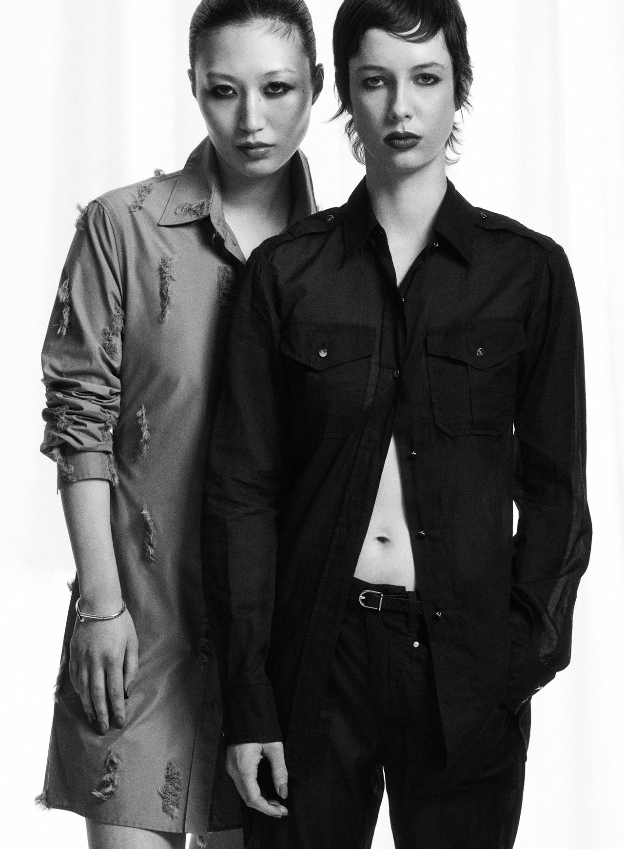 Two women in Durazzi Milano outfits photographed in black and white