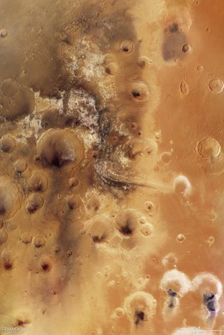 This mosaic of the Martian surface shows one of the biggest valleys on Mars. Named Mawrth Vallis, it stretches 573 miles (600 km) and is up tp 1.25 miles (2 km) deep. Scientists believe water once flowed into this valley, and that it may have been potentially habitable. The European Space Agency's Mars Express orbiter took 9 photos to create this mosaic.