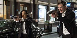 Tessa Thompson and Chris Hemsworth as Agent M and Agent H in Men in Black: International