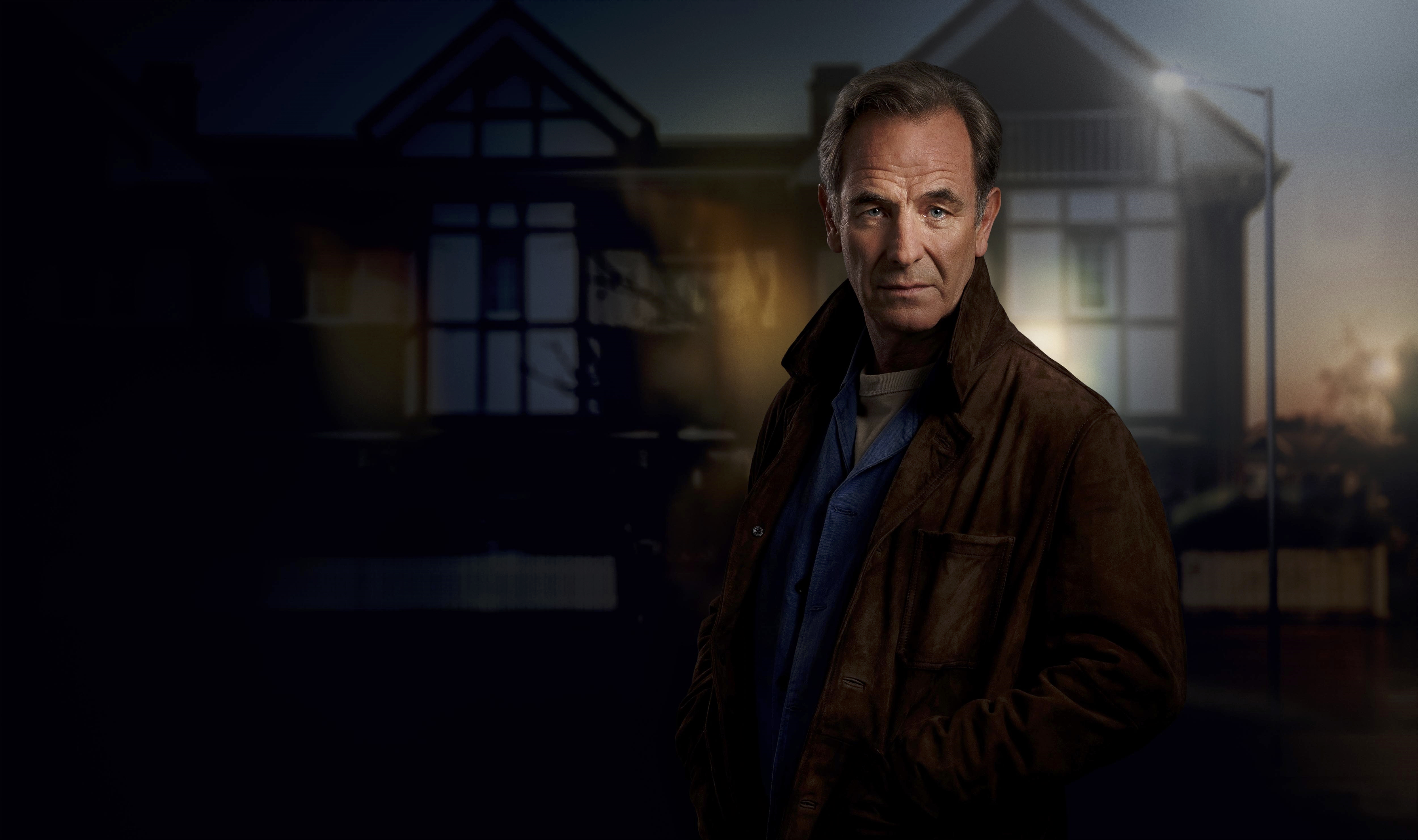 Robson Green as Patrick Harbottle standing outside a house in The Game.